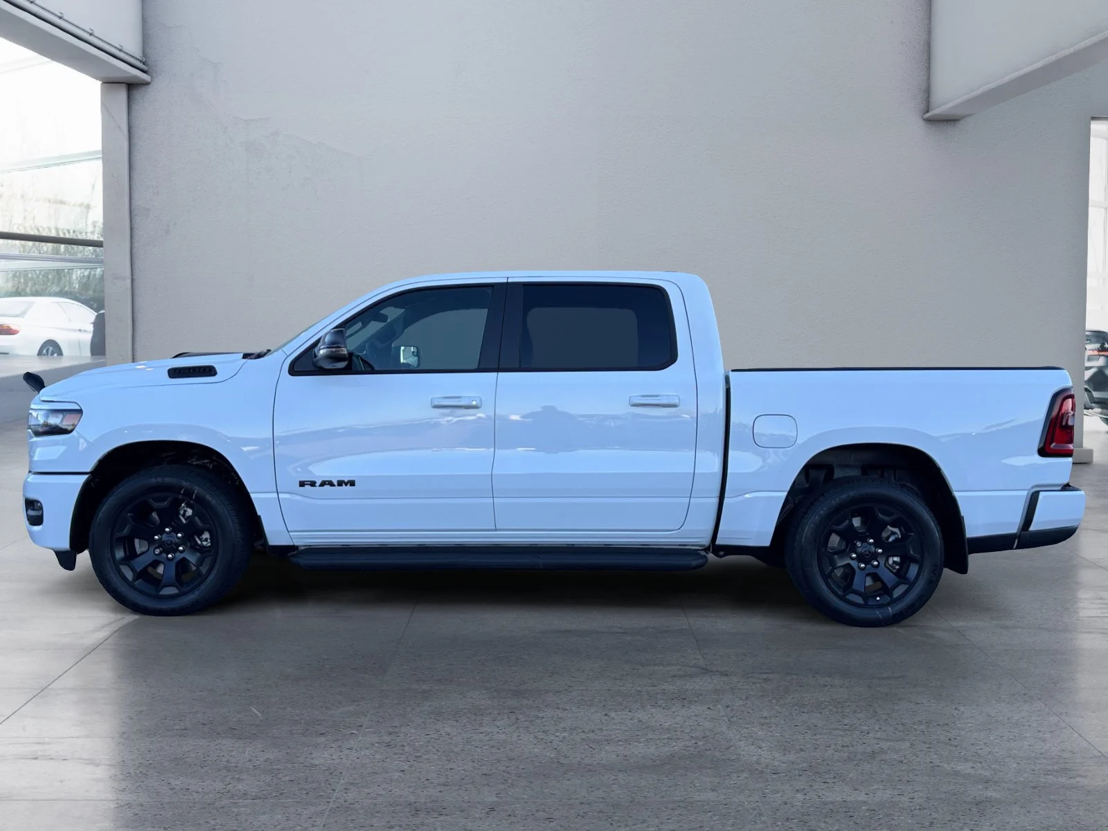 New 2027 Bright White Ram Sport image 2