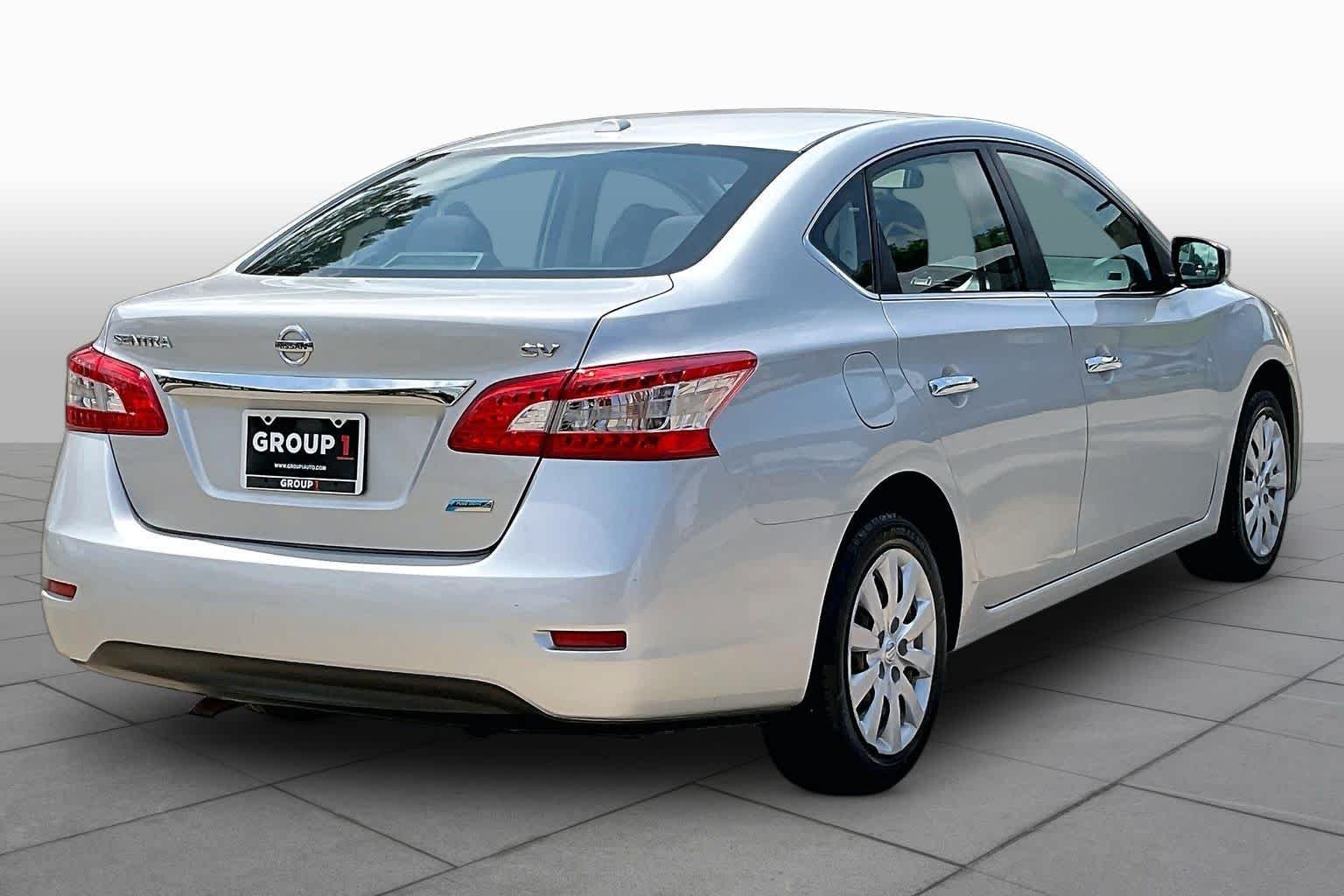 Used 2014 Brilliant Silver Nissan SV image 13