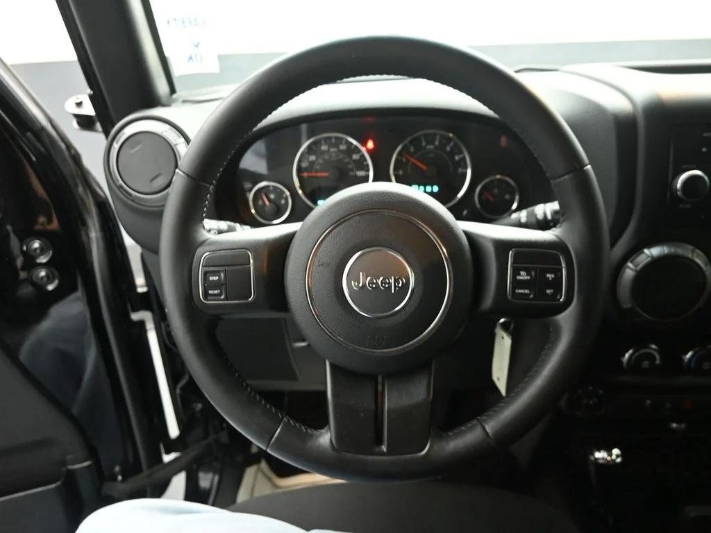Used 2015 Black Jeep Unlimited Sport image 14