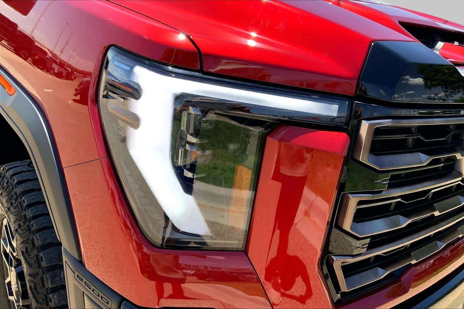 Used 2025 Volcanic Red Tintcoat GMC AT4X image 36