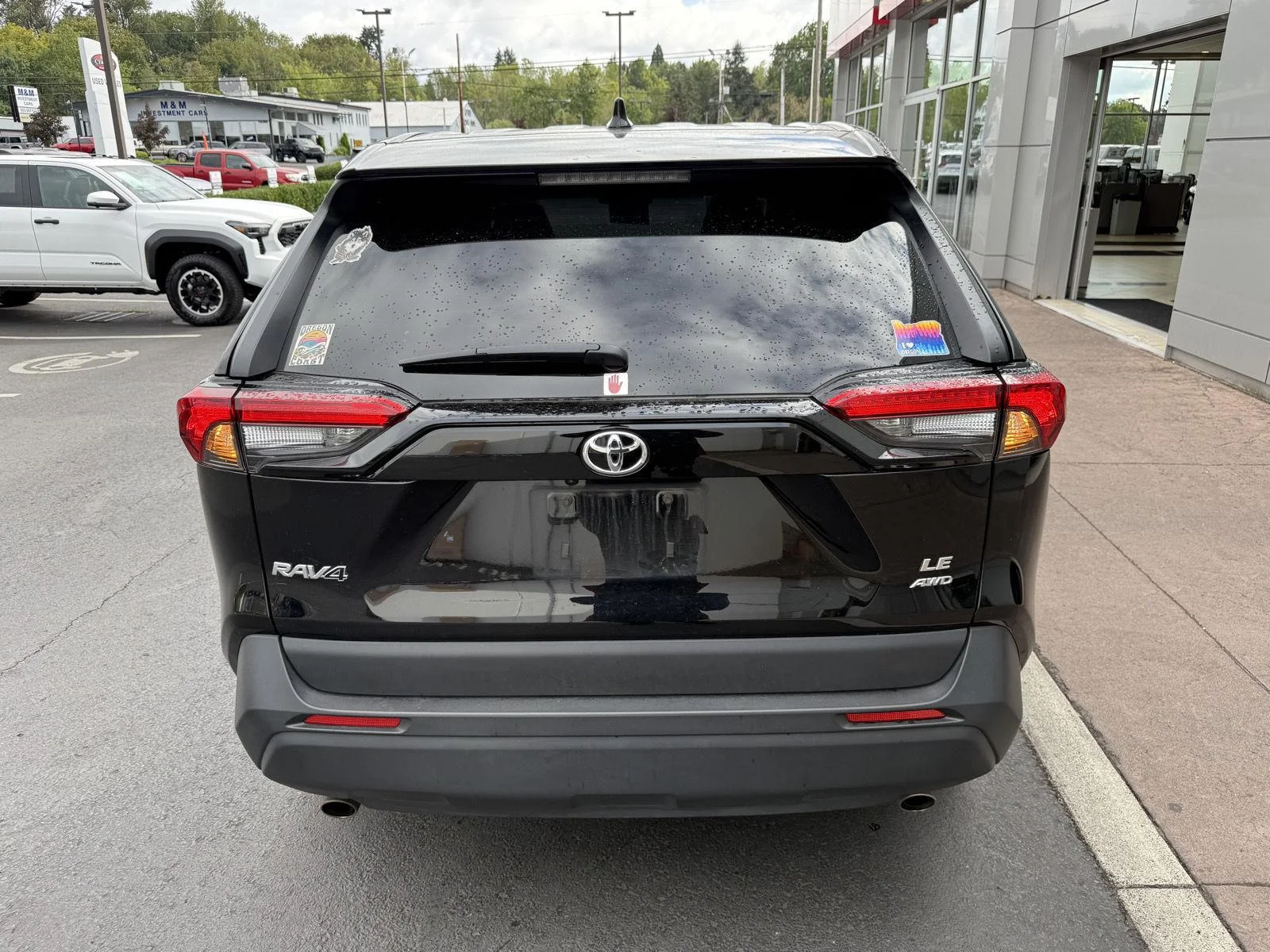 Used 2025 Midnight Black Metallic Toyota LE image 4