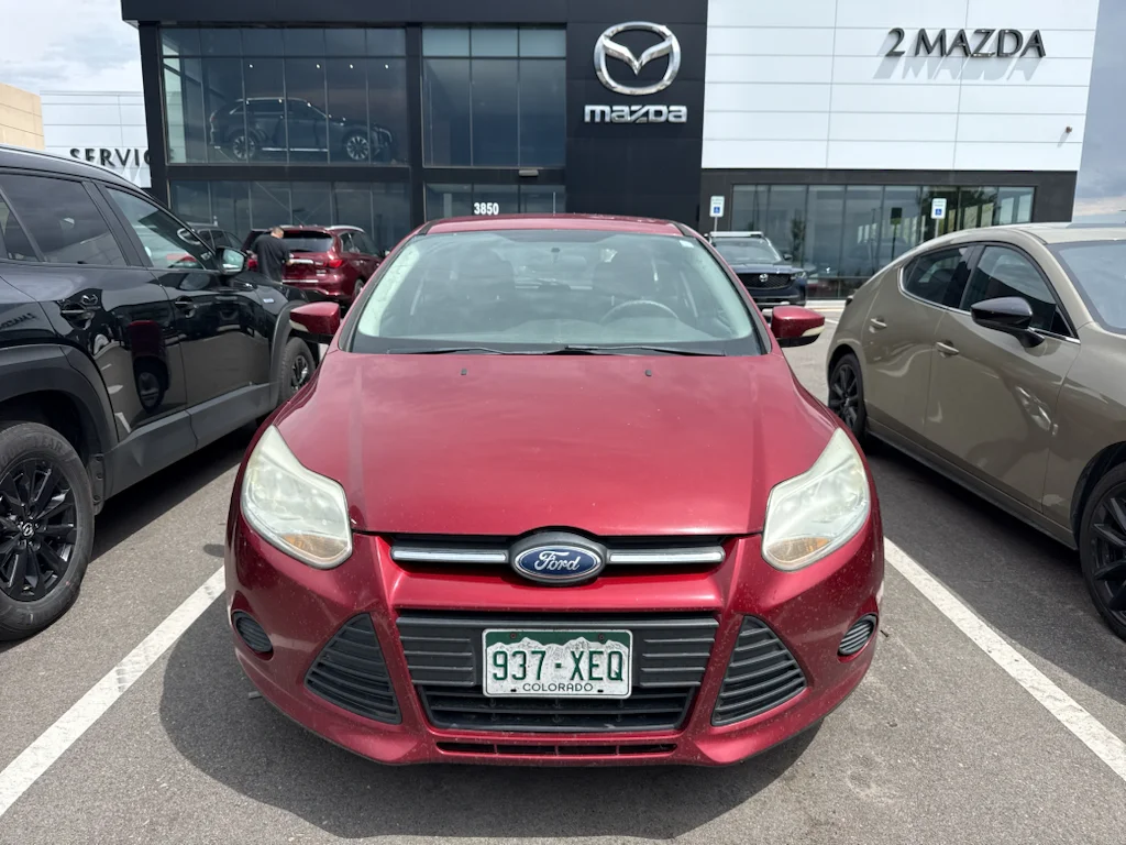 Used 2014 Ruby Red Tinted Clearcoat Ford SE image 1