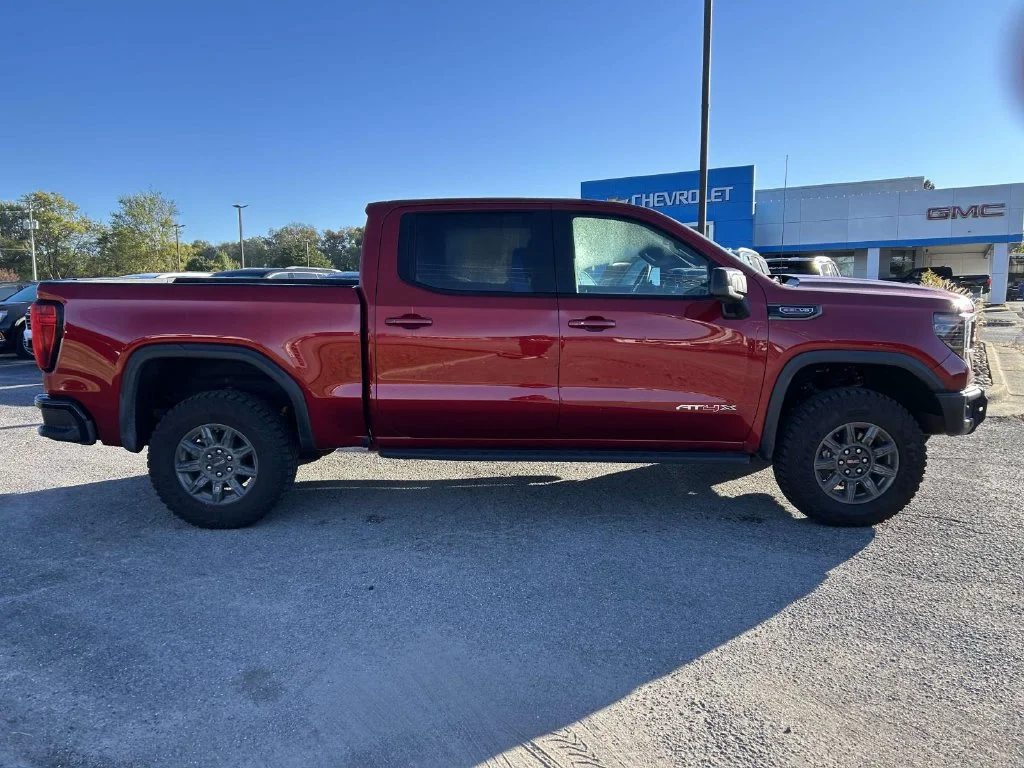 New 2026 VOLCANIC RED TINTCOAT GMC AT4X image 2