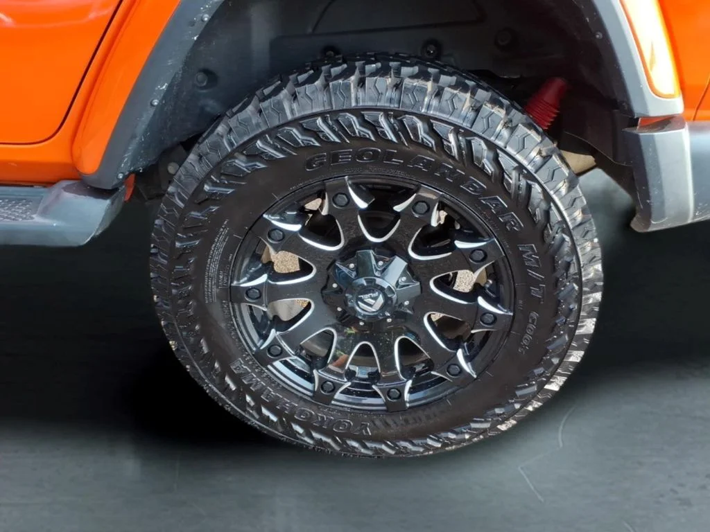 Used 2018 Orange Jeep Unlimited Sahara image 10