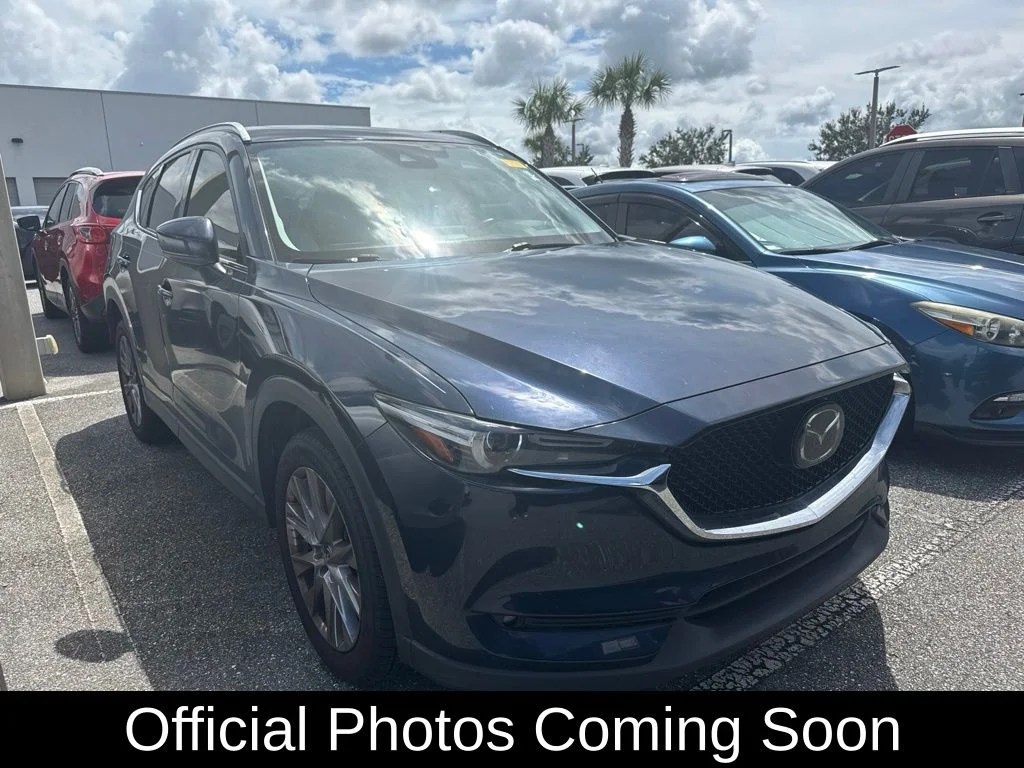 Used 2019 Blue Mazda Grand Touring image 1