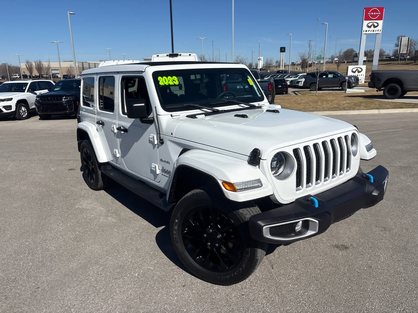 Used 2023 Jeep Wrangler 4xe Sahara 4XE with VIN 1C4JJXP69PW573667 for sale in Kansas City
