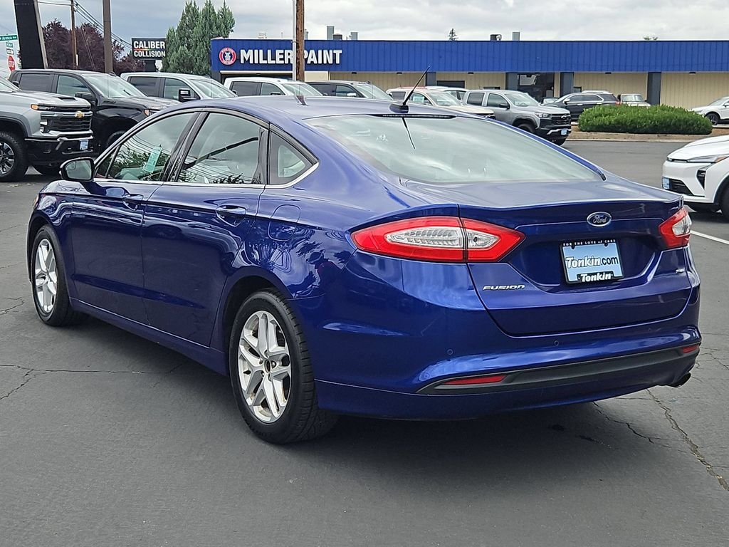 Used 2014 Blue Metallic Ford SE image 4