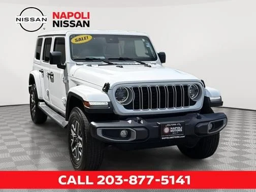 Used 2024 White Jeep Sahara image 1