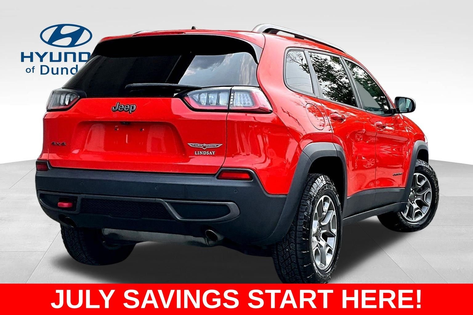 Used 2021 Orange Jeep Trailhawk image 7