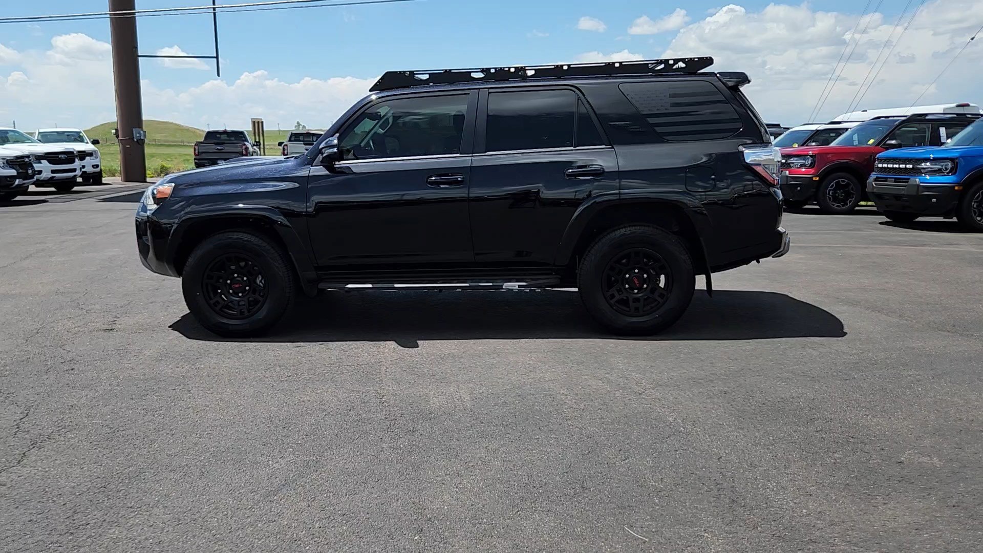 Certified Used 2024 Midnight Black Metallic Toyota TRD Off Road image 2