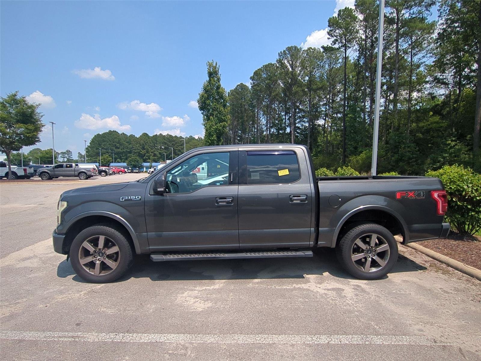 Used 2015 Magnetic Metallic Ford Lariat image 4