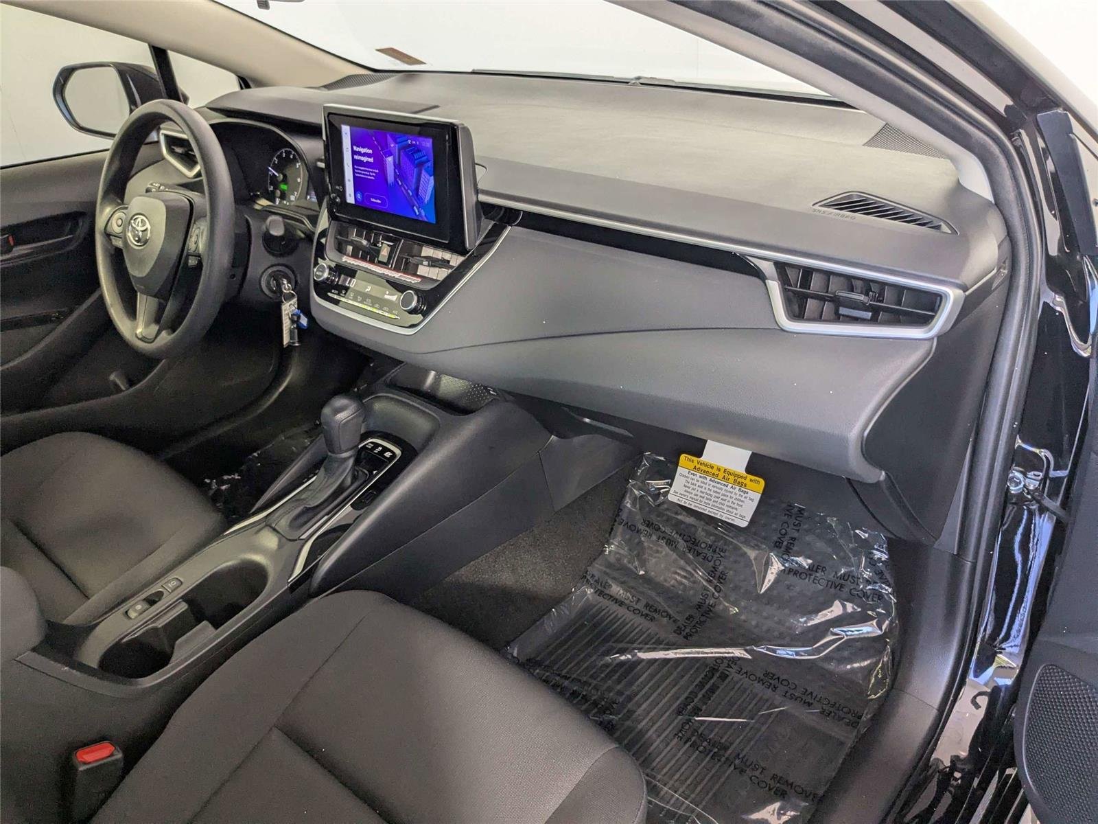 Certified Used 2024 Midnight Black Metallic Toyota Hybrid LE image 29