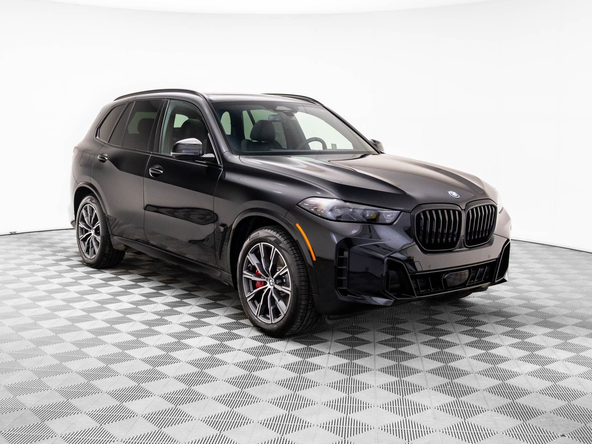 New 2026 Black Sapphire Metallic BMW xDrive50e image 8