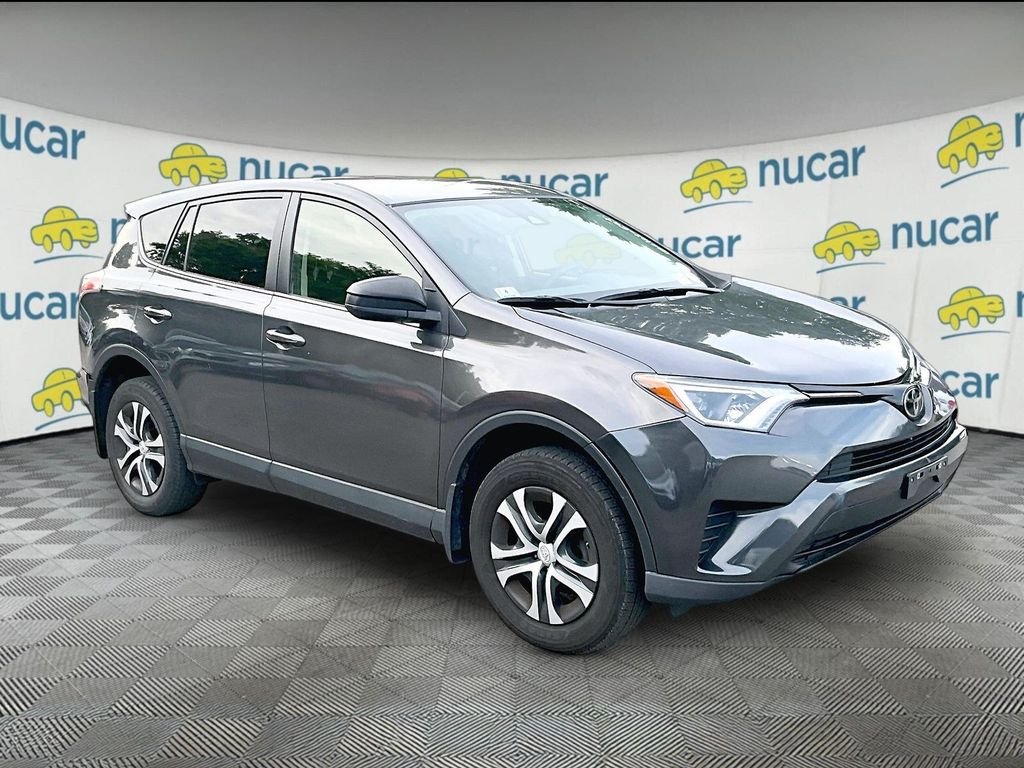Used 2018 Gray Toyota LE image 1