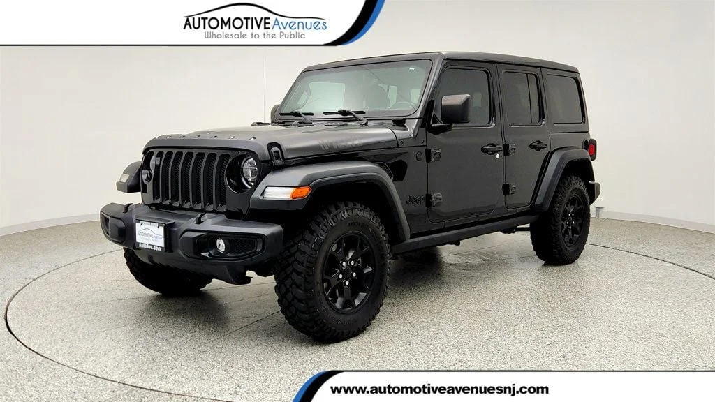 Used 2022 Black Clearcoat Jeep Unlimited Willys 4x4 w/ Sky One-Touch Top & Alpine Audio image 1