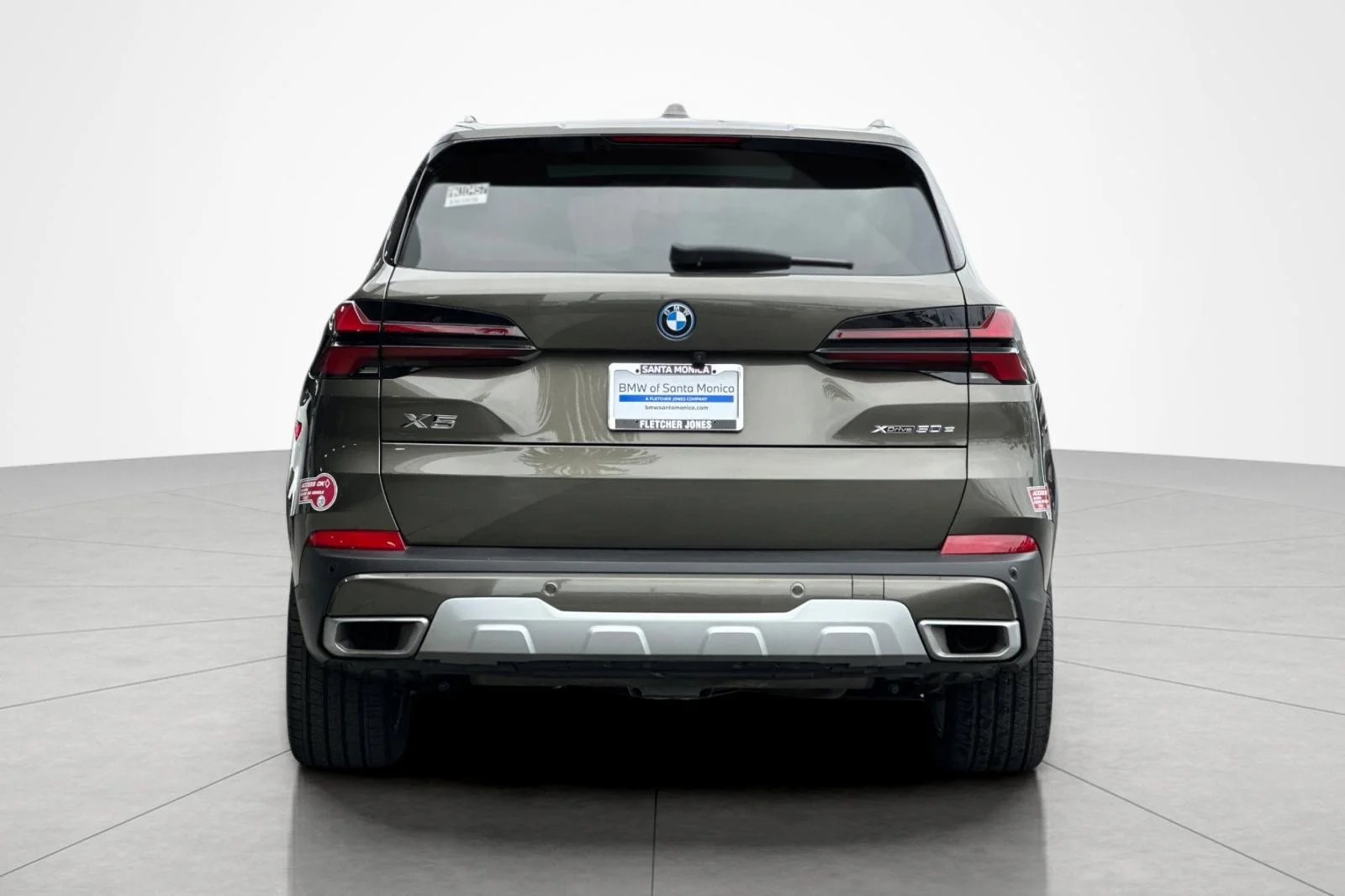 Used 2024 Manhattan Green Metallic BMW xDrive50e image 4