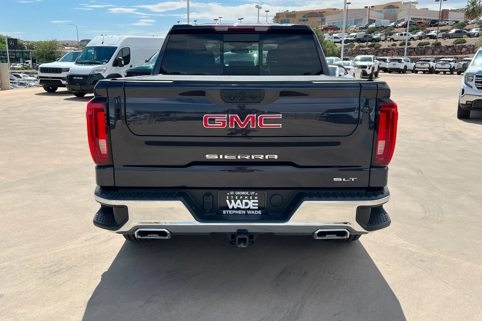Used 2023 Titanium Rush Metallic GMC SLT image 4
