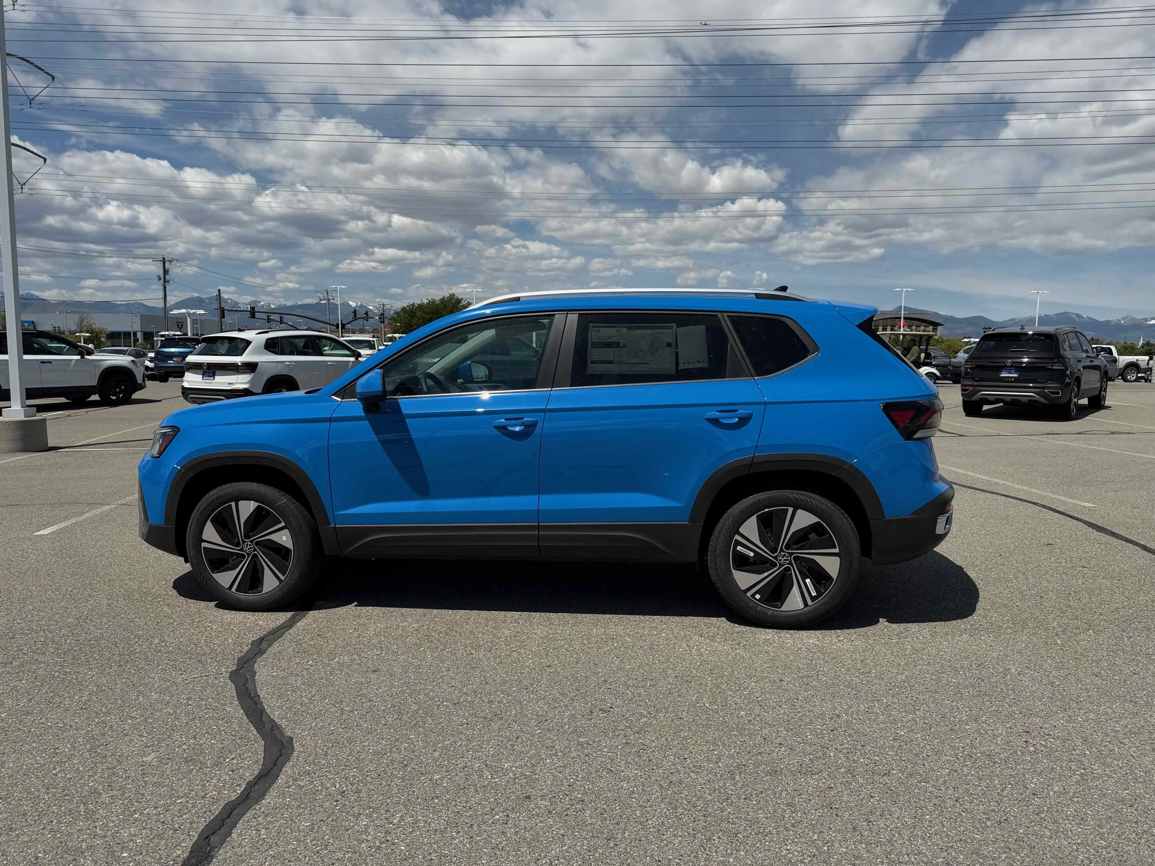 New 2026 Blue Volkswagen SE image 2