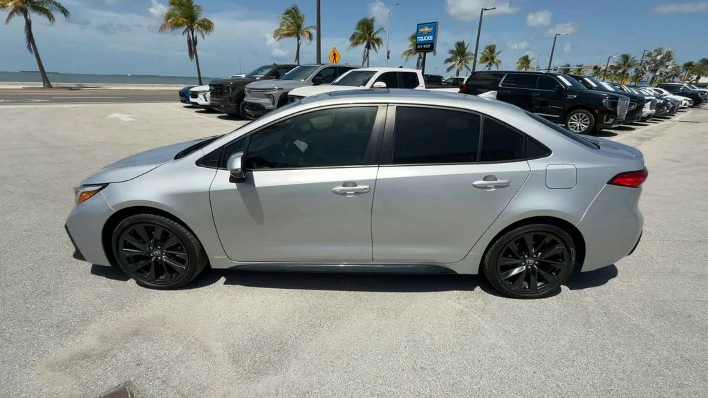Used 2023 Classic Silver Metallic Toyota SE image 5