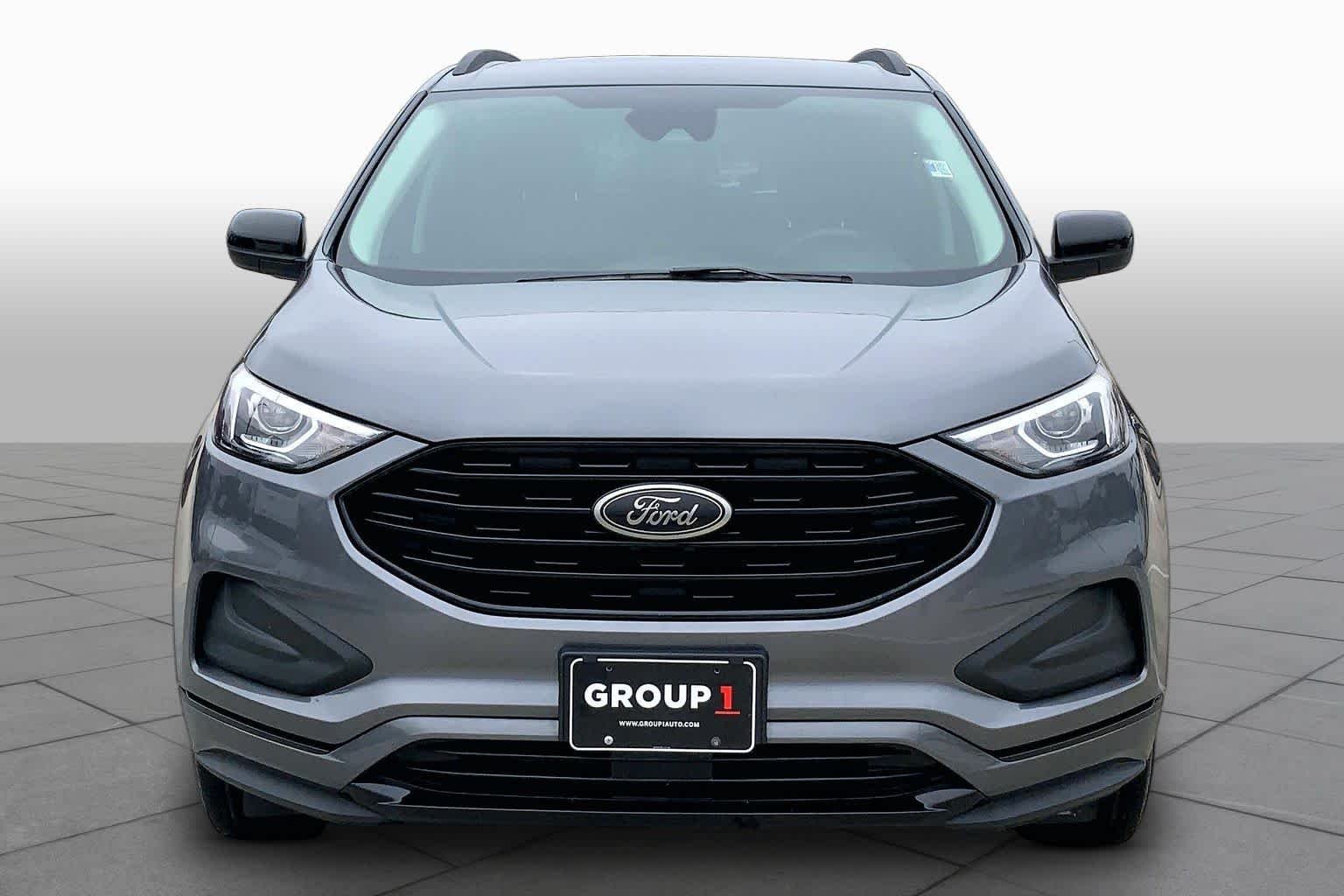 Used 2024 Carbonized Gray Metallic Ford SE image 3