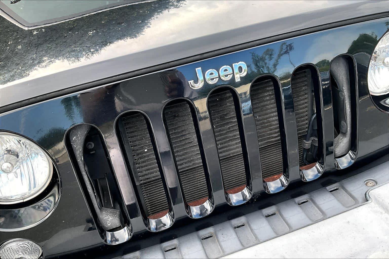 Used 2016 Black Clearcoat Jeep Sport image 27