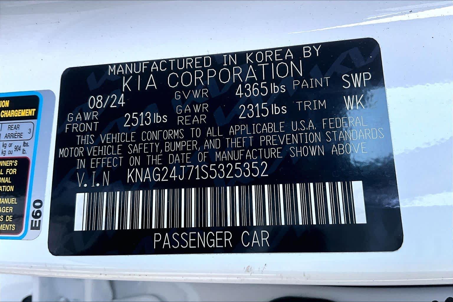 Used 2025 Snow White Pearl Kia LXS image 36