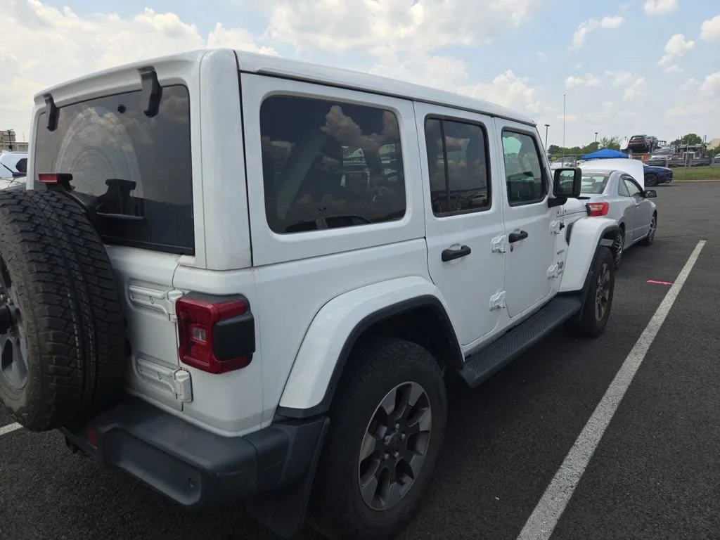 Used 2019 White Jeep Unlimited Sahara image 2