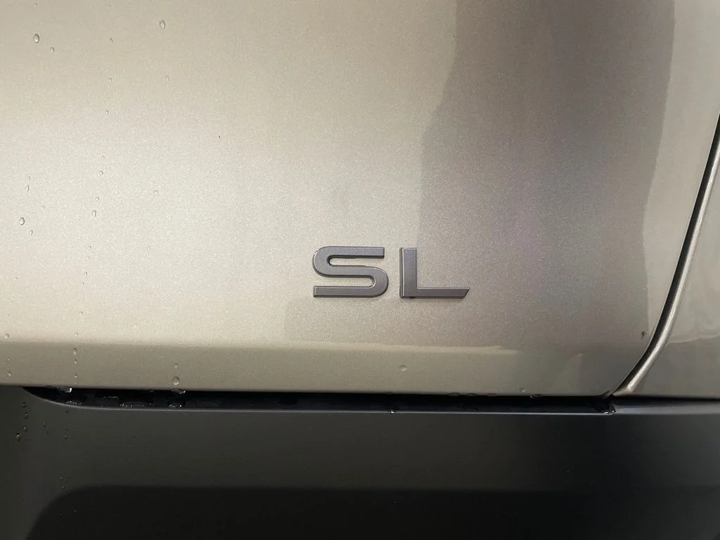 Used 2026 Champagne Silver Metallic Nissan SL image 9