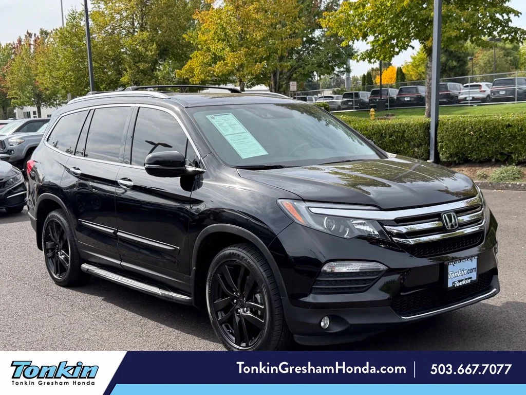 Used 2018 Crystal Black Pearl Honda Elite image 1