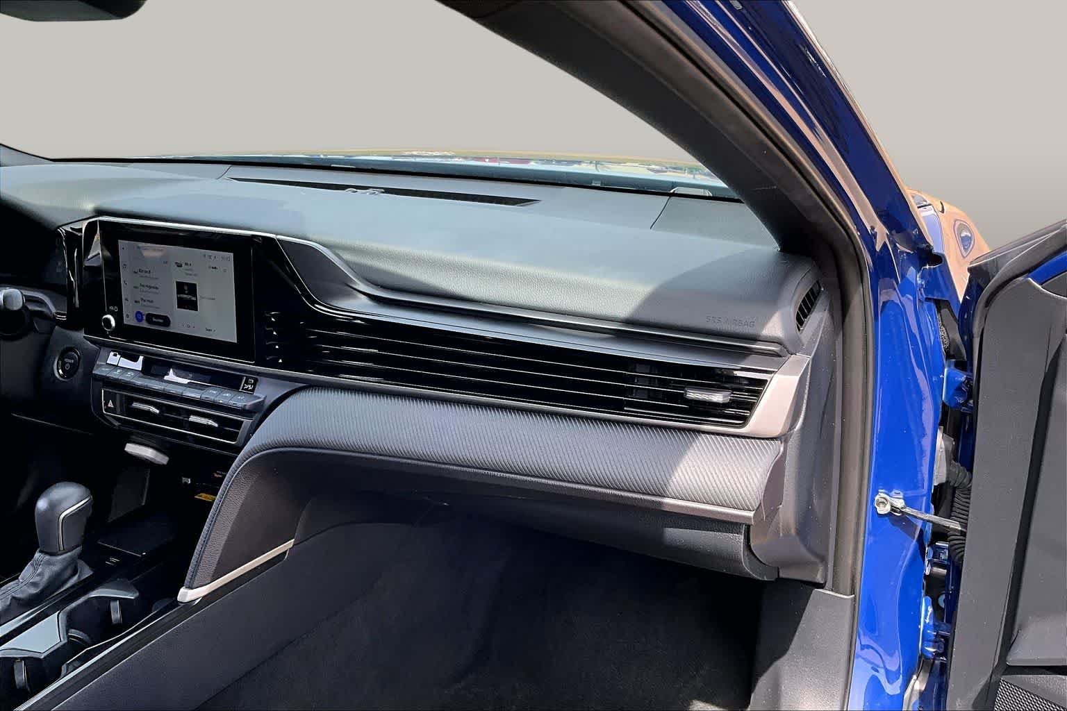 Used 2025 Reservoir Blue Toyota SE image 17