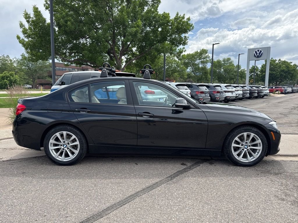 Used 2018 Black Sapphire Metallic BMW 320i xDrive image 6