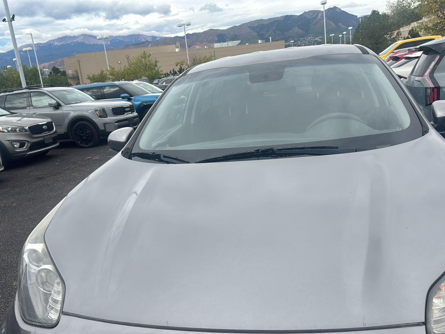 Used 2018 Mineral Silver Kia LX image 1