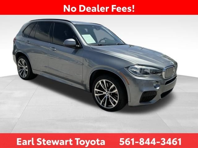 Used 2014 BMW X5 xDrive50i with VIN 5UXKR6C54E0J71963 for sale in Lake Park, FL