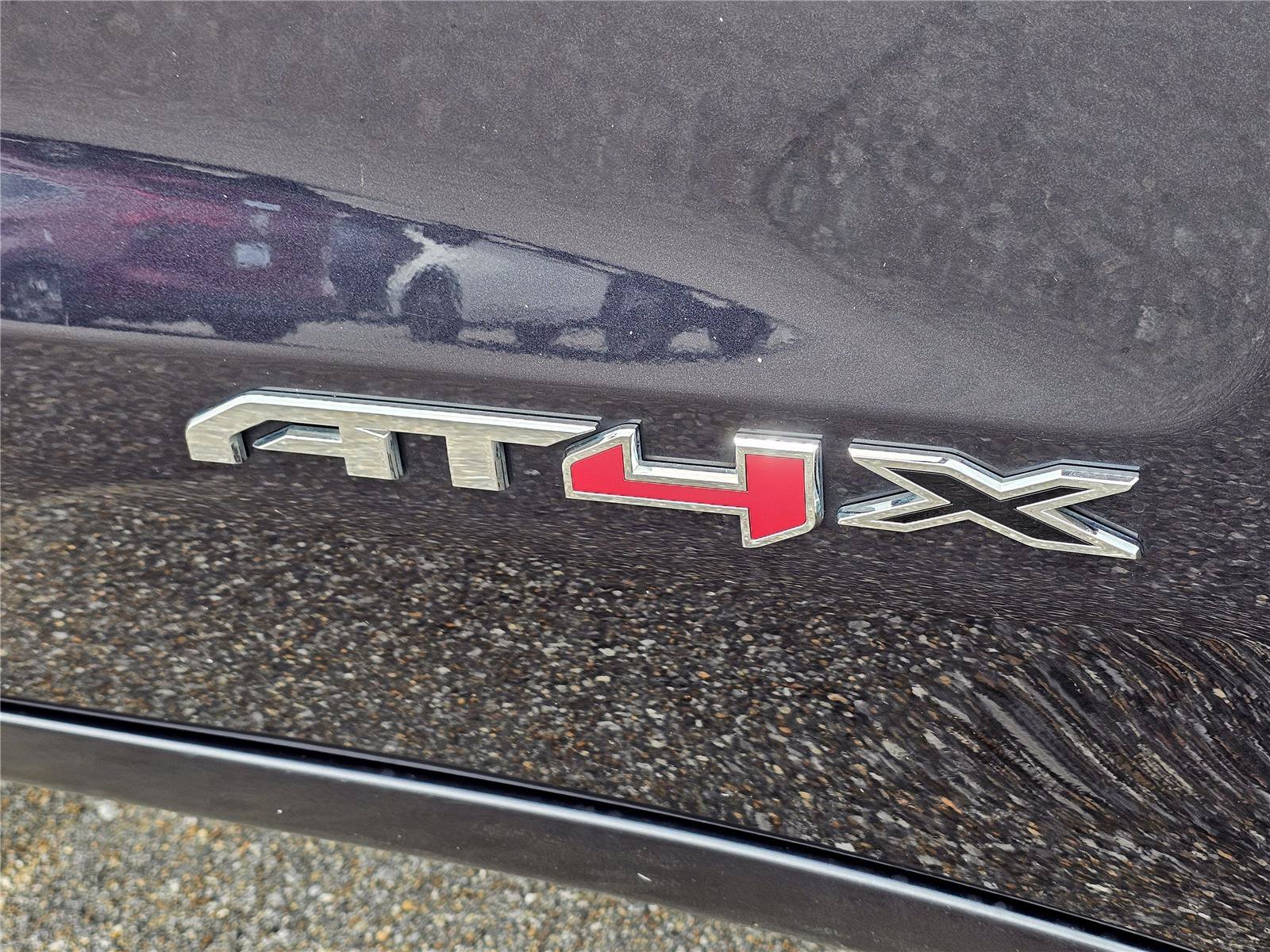 Used 2024 Titanium Rush Metallic GMC AT4X image 8