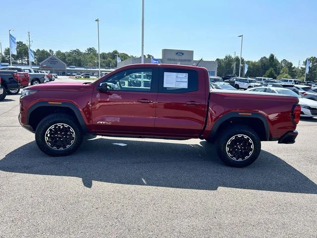Used 2026 Volcanic Red GMC AT4 image 6