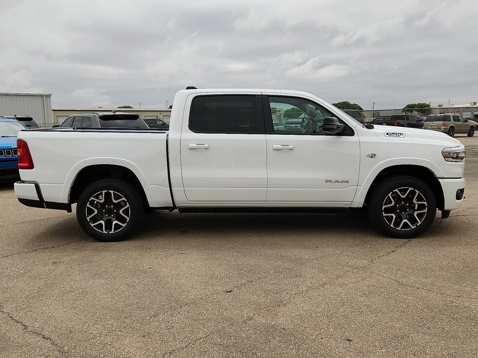 New 2026 Bright White Clear-Coat  Paint Ram LARAMIE CREW CAB 4X4 5
