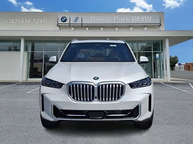 New 2026 Mineral White Metallic BMW xDrive50e image 2
