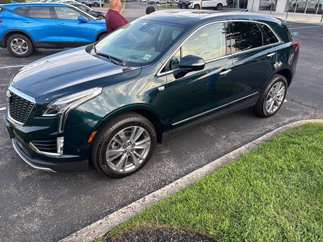 Used 2024 Emerald Lake Metallic Cadillac Premium Luxury image 1