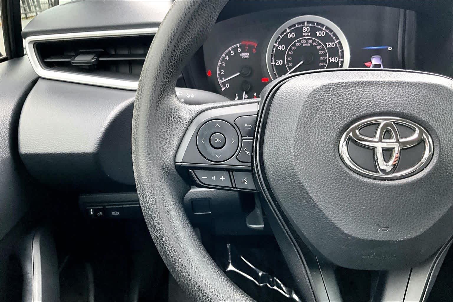 Used 2021 Super White Toyota LE image 24