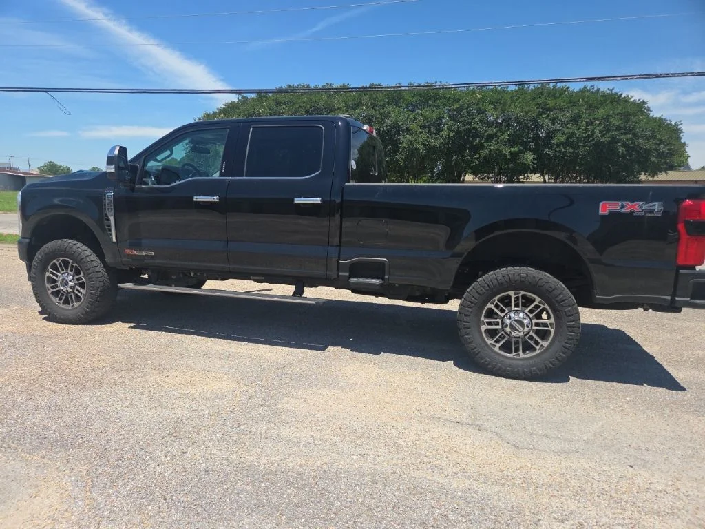 Used 2024 Black Metallic Ford Limited image 4