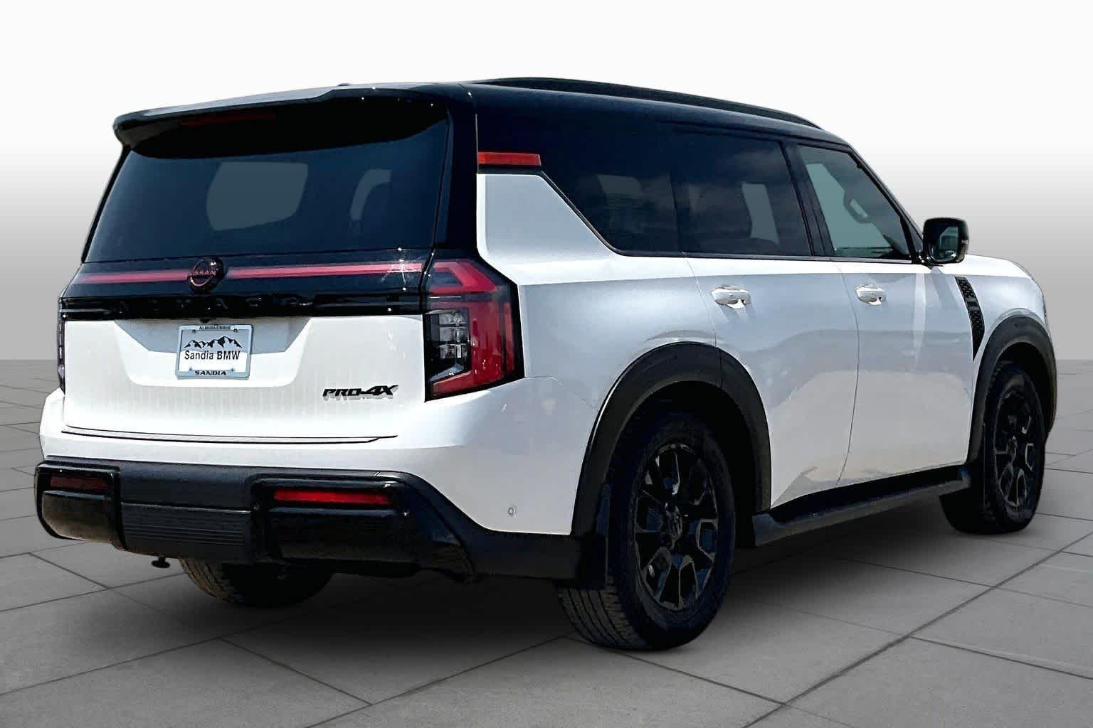 Used 2025 Aspen White Tricoat/Super Black Nissan PRO-4X image 10