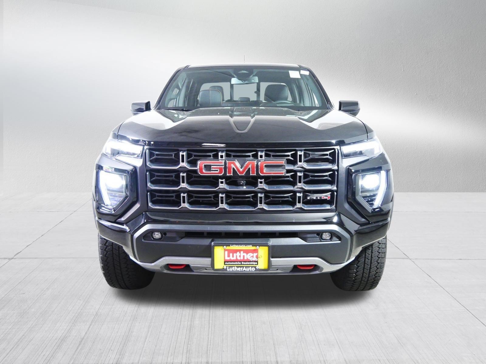 Used 2025 GMC Canyon AT4 with VIN 1GTP2DEK8S1115081 for sale in Brooklyn Center, Minnesota