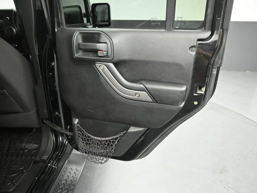 Used 2015 Black Jeep Unlimited Sport image 25