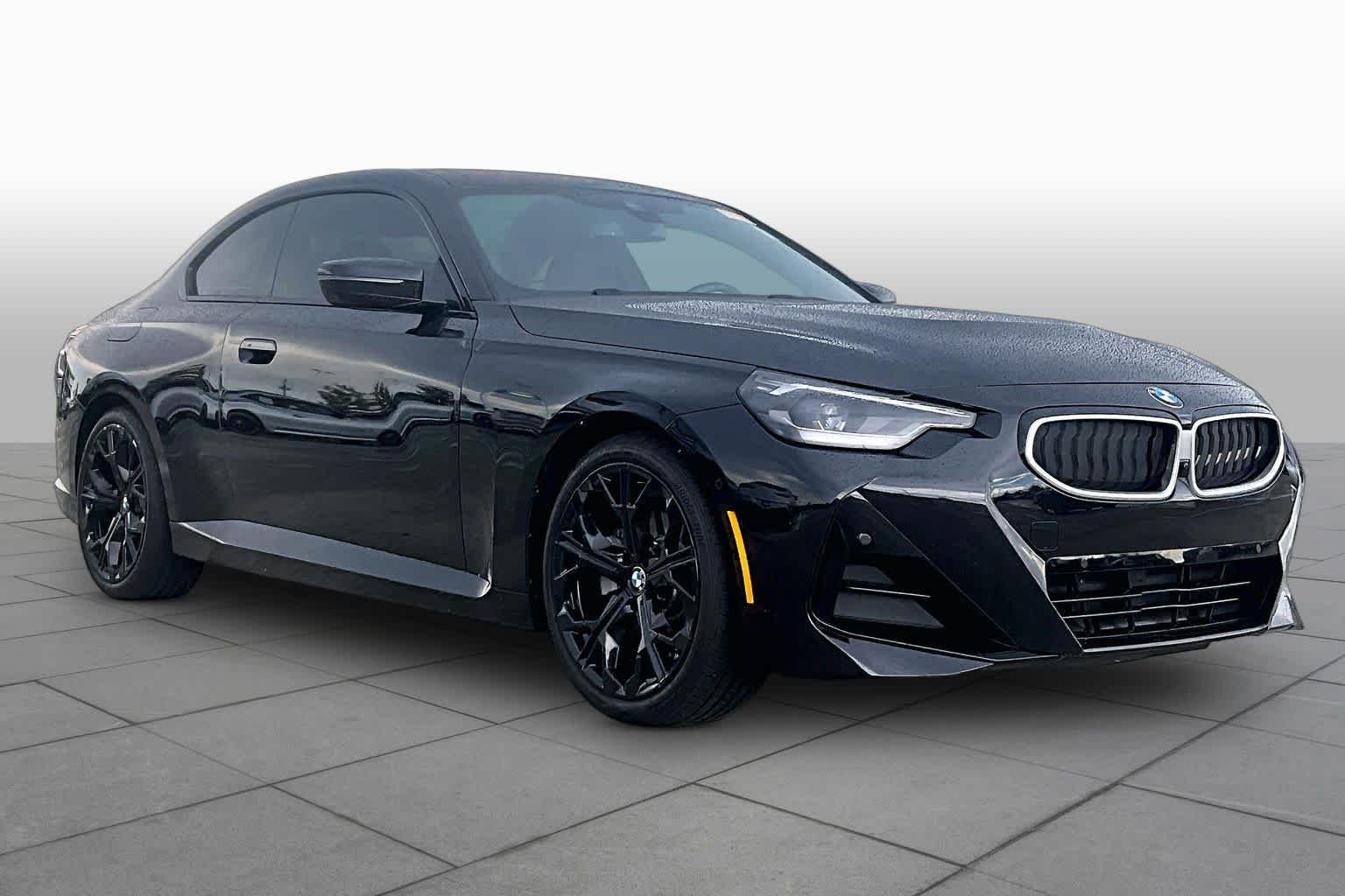 Used 2025 Black Sapphire Metallic BMW 230i xDrive image 3