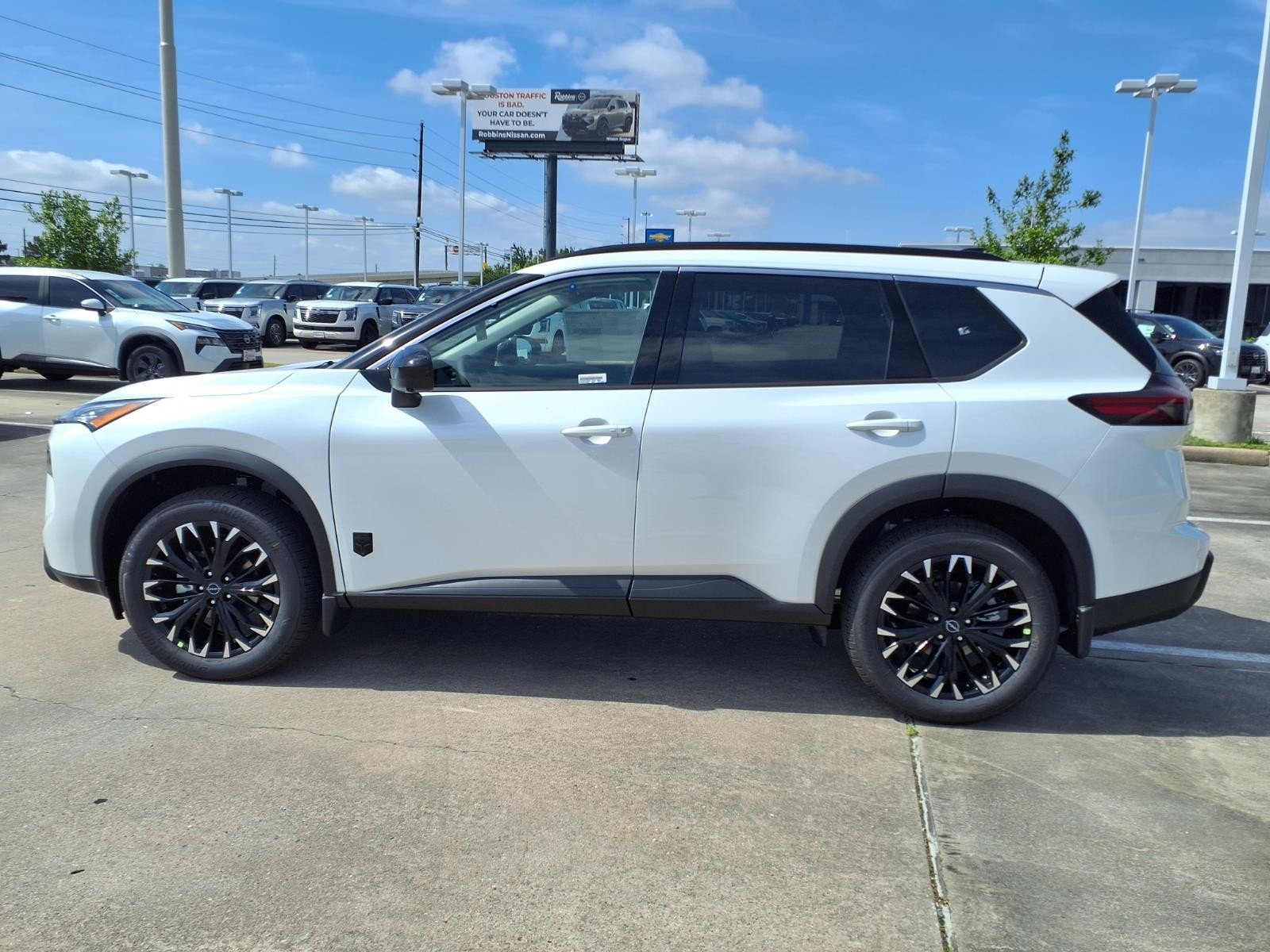 2026 Nissan Rogue Dark Armor™ White at Robbins Nissan