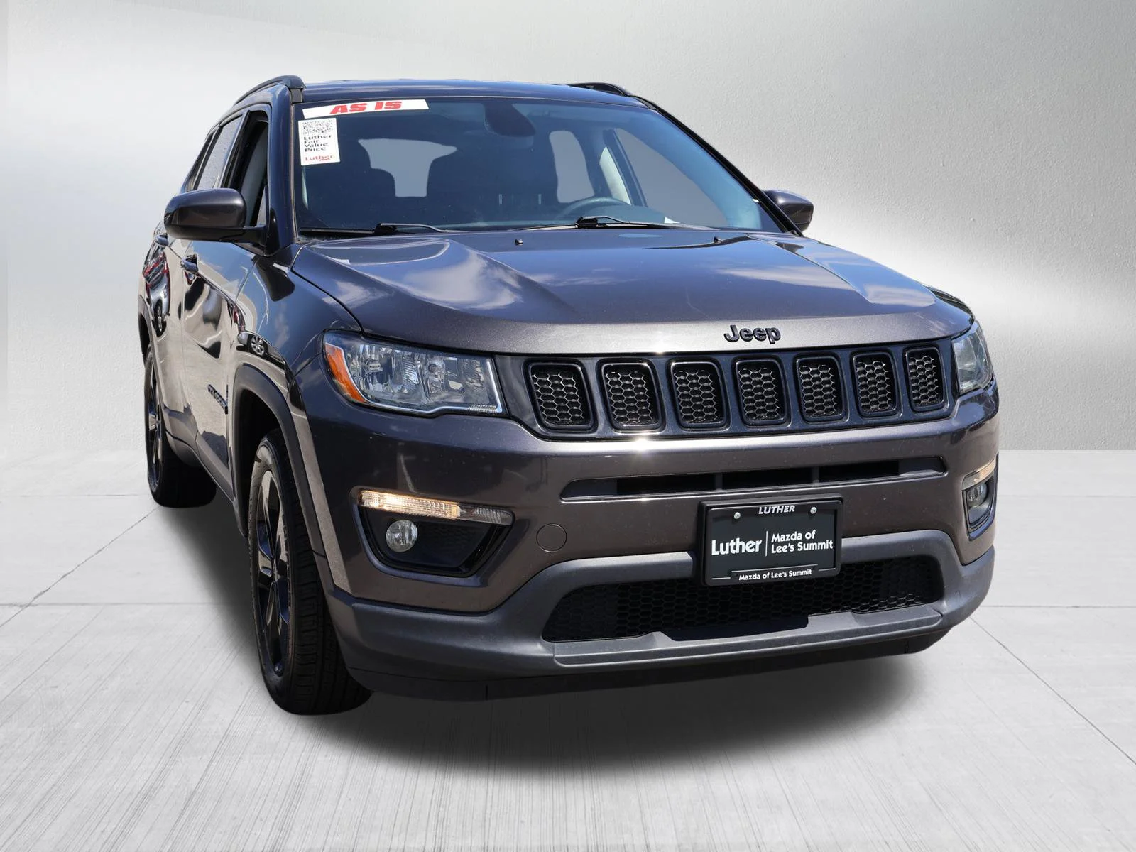 Used 2018 Granite Crystal Metallic Clearcoat Jeep Altitude image 1