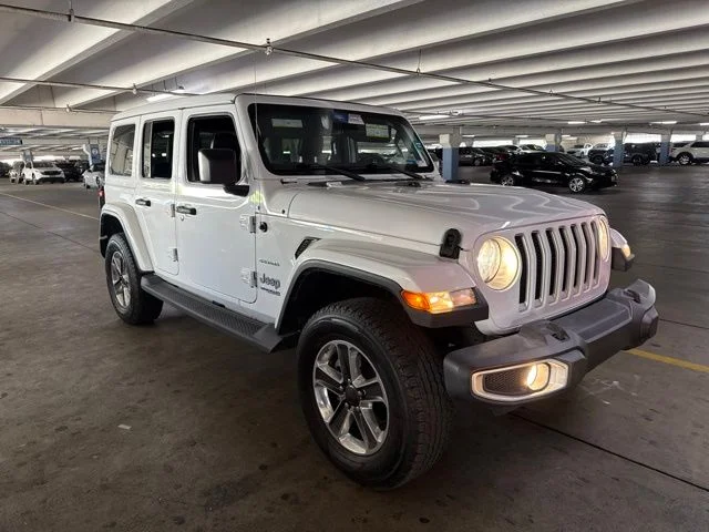 Used 2022 White Jeep Unlimited Sahara image 1