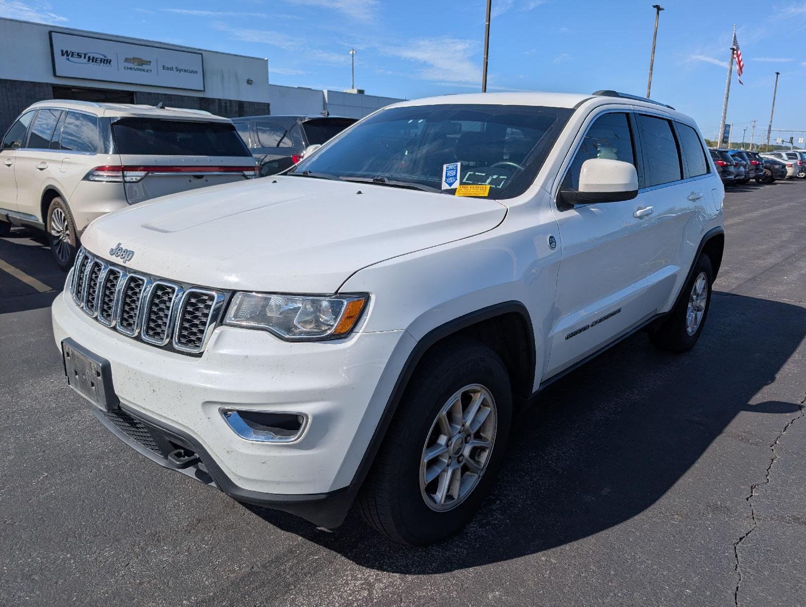 Used 2019 Bright White Clearcoat Jeep Laredo E image 4