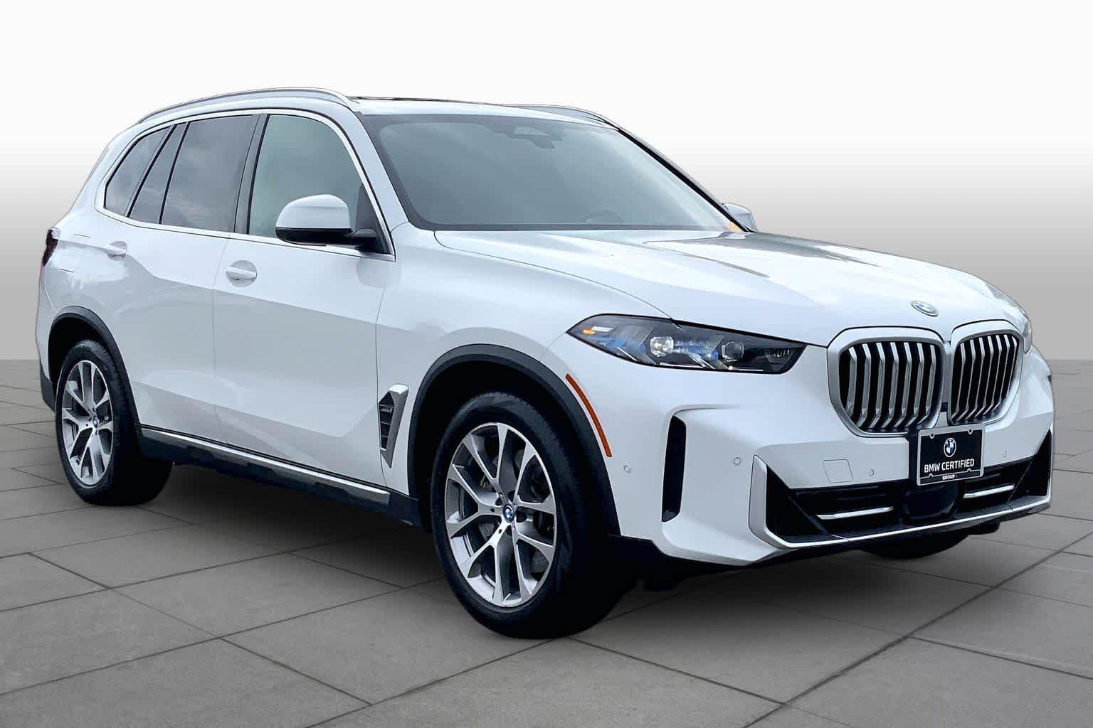 Used 2024 Mineral White Metallic BMW xDrive50e image 2