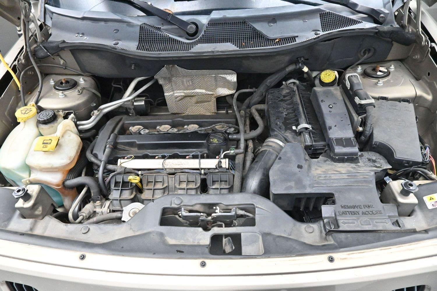 Used 2008 Light Khaki Metallic Jeep Sport image 29